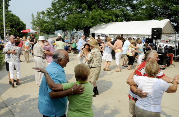 People enjoy the Festival of the Lakes Polka Party at the Hammond Marina in Hammond, Ind. Sunday July 20, 2014. Stephanie Dowell, The Times